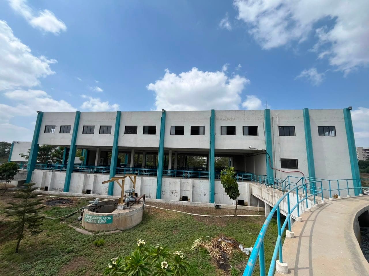 Front elevation of the rapid-gravity filter house and clariflocculator block at the PCMC 100 MLD water treatment plant
